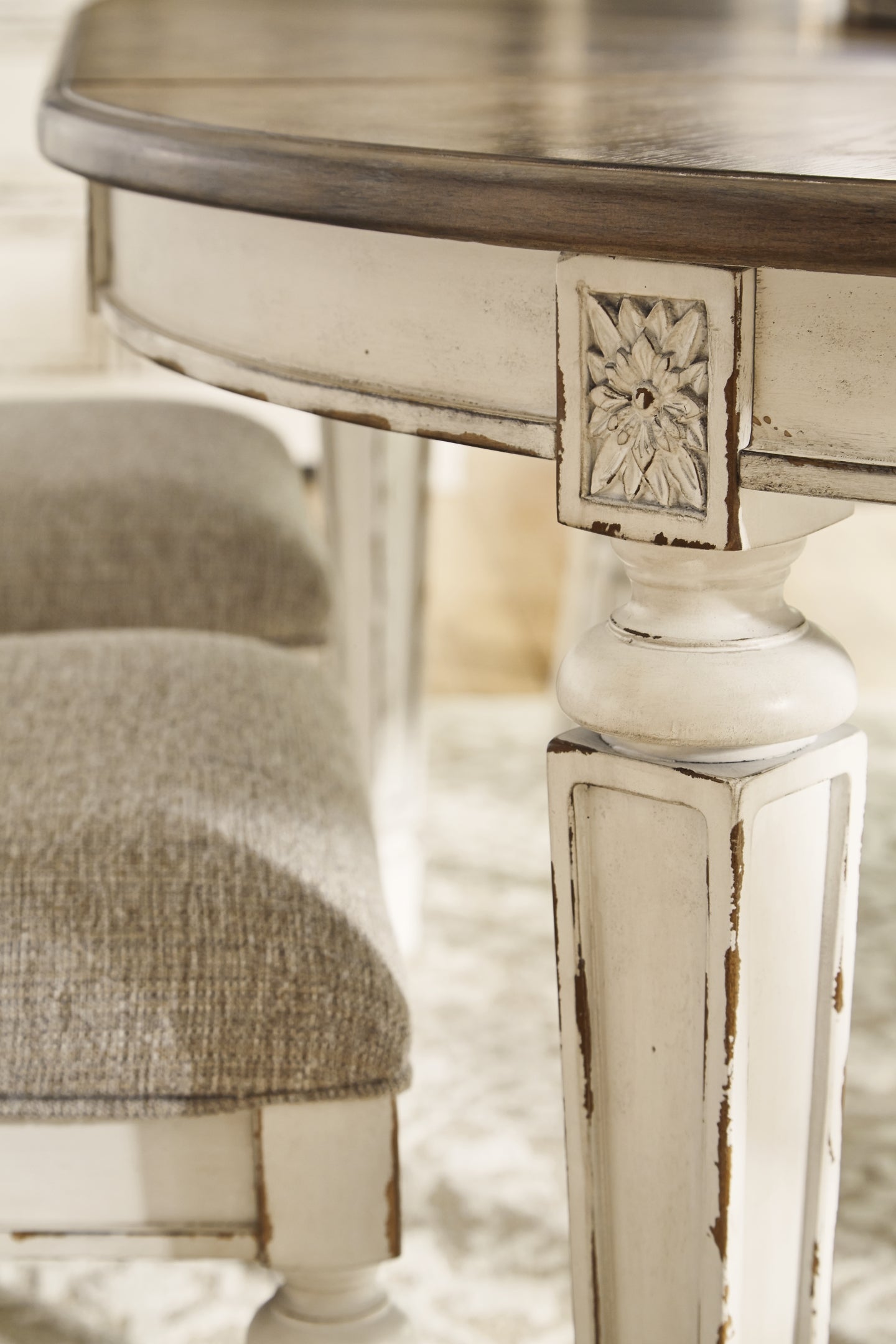 Realyn Dining Table and 4 Chairs at Walker Mattress and Furniture Locations in Cedar Park and Belton TX.