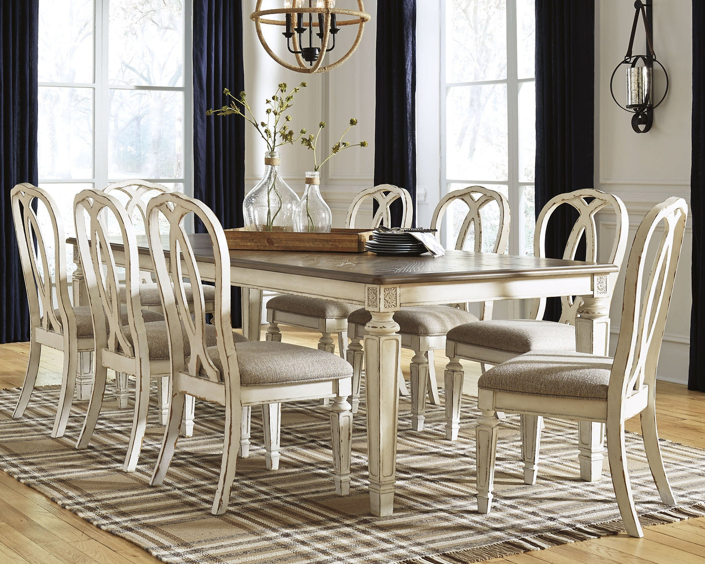 Realyn Dining Table and 8 Chairs at Walker Mattress and Furniture Locations in Cedar Park and Belton TX.