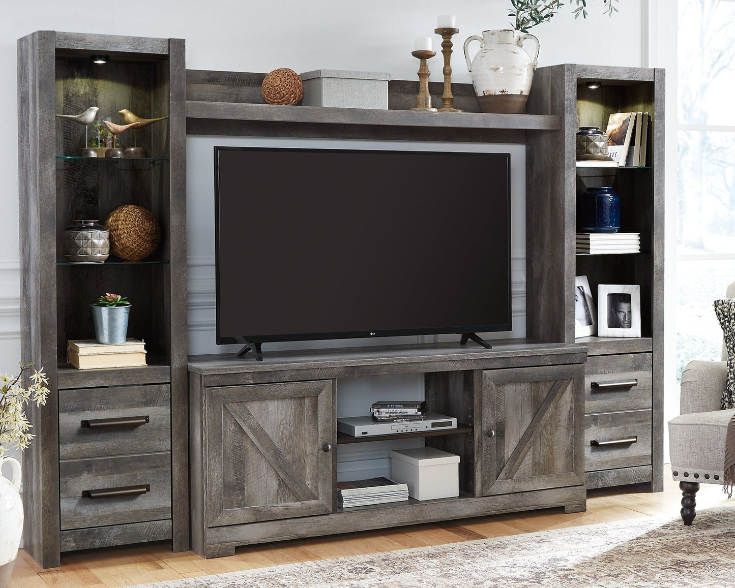 Wynnlow 4-Piece Entertainment Center at Walker Mattress and Furniture Locations in Cedar Park and Belton TX.