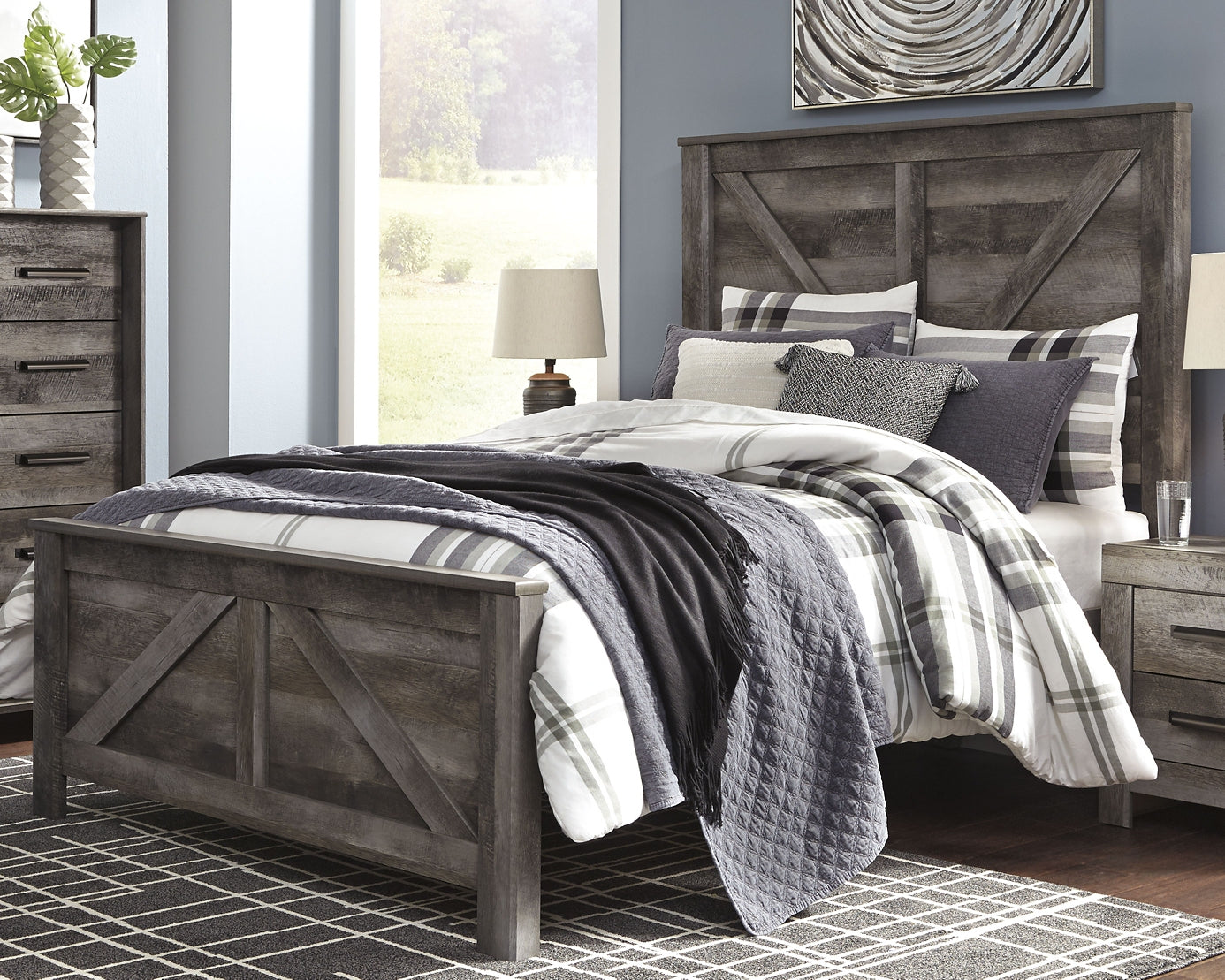 Wynnlow Queen Crossbuck Panel Bed with Mirrored Dresser, Chest and Nightstand at Walker Mattress and Furniture Locations in Cedar Park and Belton TX.