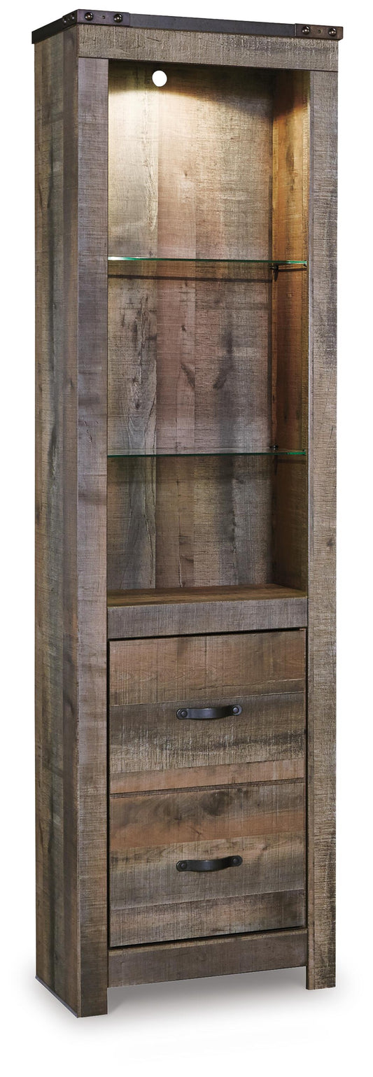 The Trinell Pier is a tall wooden entertainment center with a rustic finish, adjustable glass shelves above, two drawers below, metal handles, and a built-in top light.