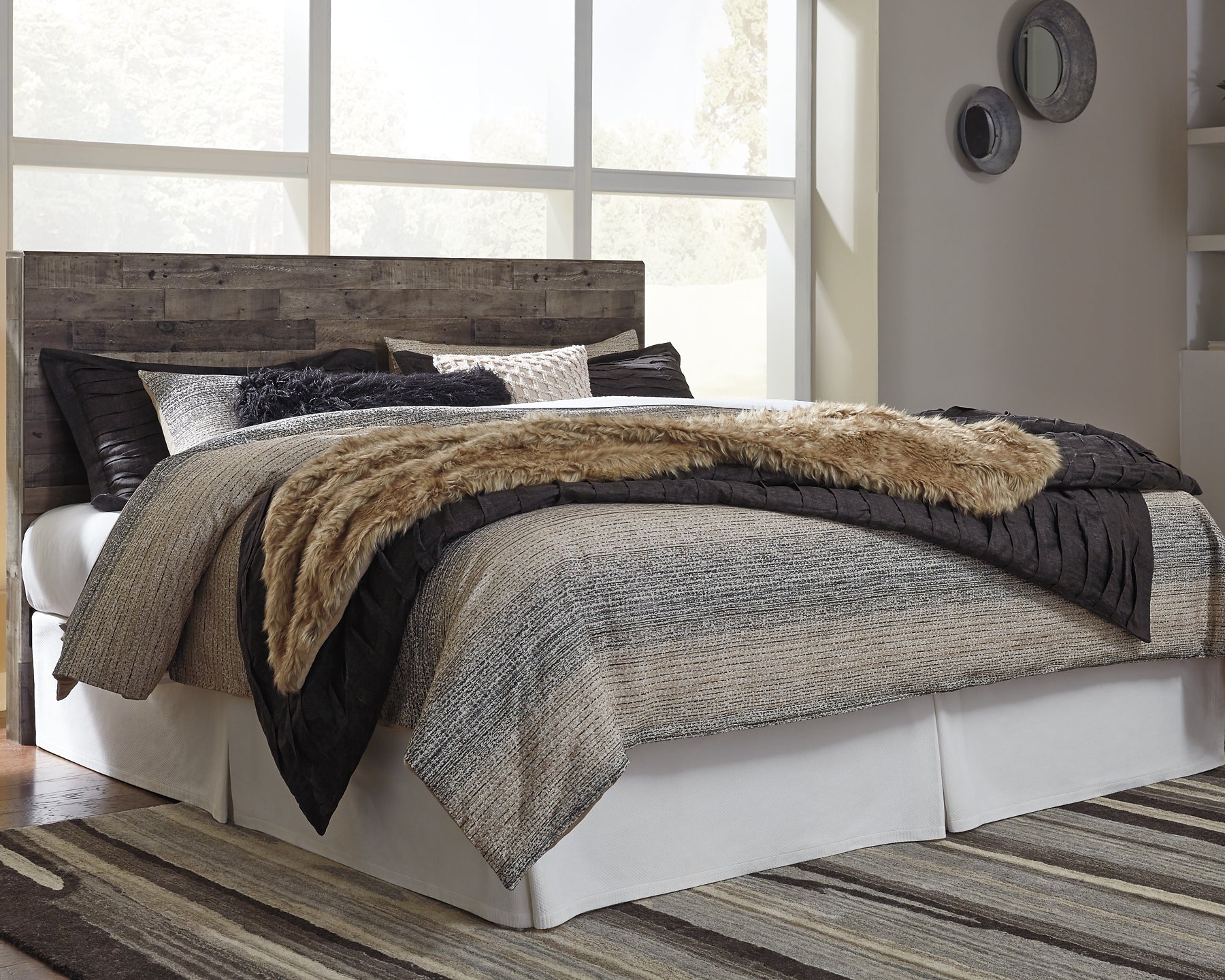 Derekson King Panel Headboard with Mirrored Dresser, Chest and Nightstand at Walker Mattress and Furniture Locations in Cedar Park and Belton TX.