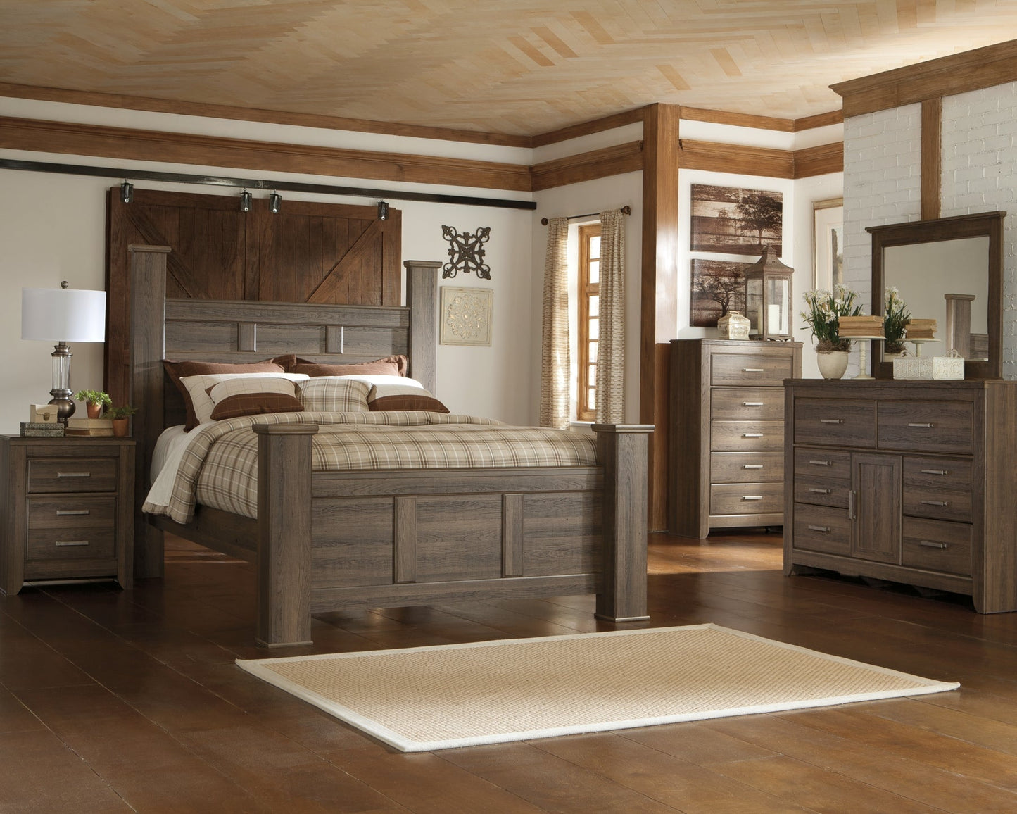 Juararo Queen Poster Bed with Mirrored Dresser, Chest and Nightstand at Walker Mattress and Furniture Locations in Cedar Park and Belton TX.