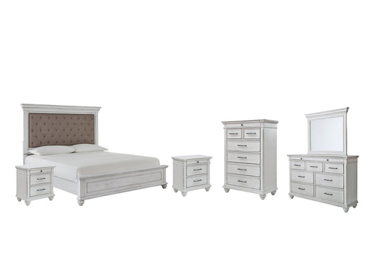 Kanwyn Queen Panel Bed with Mirrored Dresser, Chest and 2 Nightstands at Walker Mattress and Furniture Locations in Cedar Park and Belton TX.