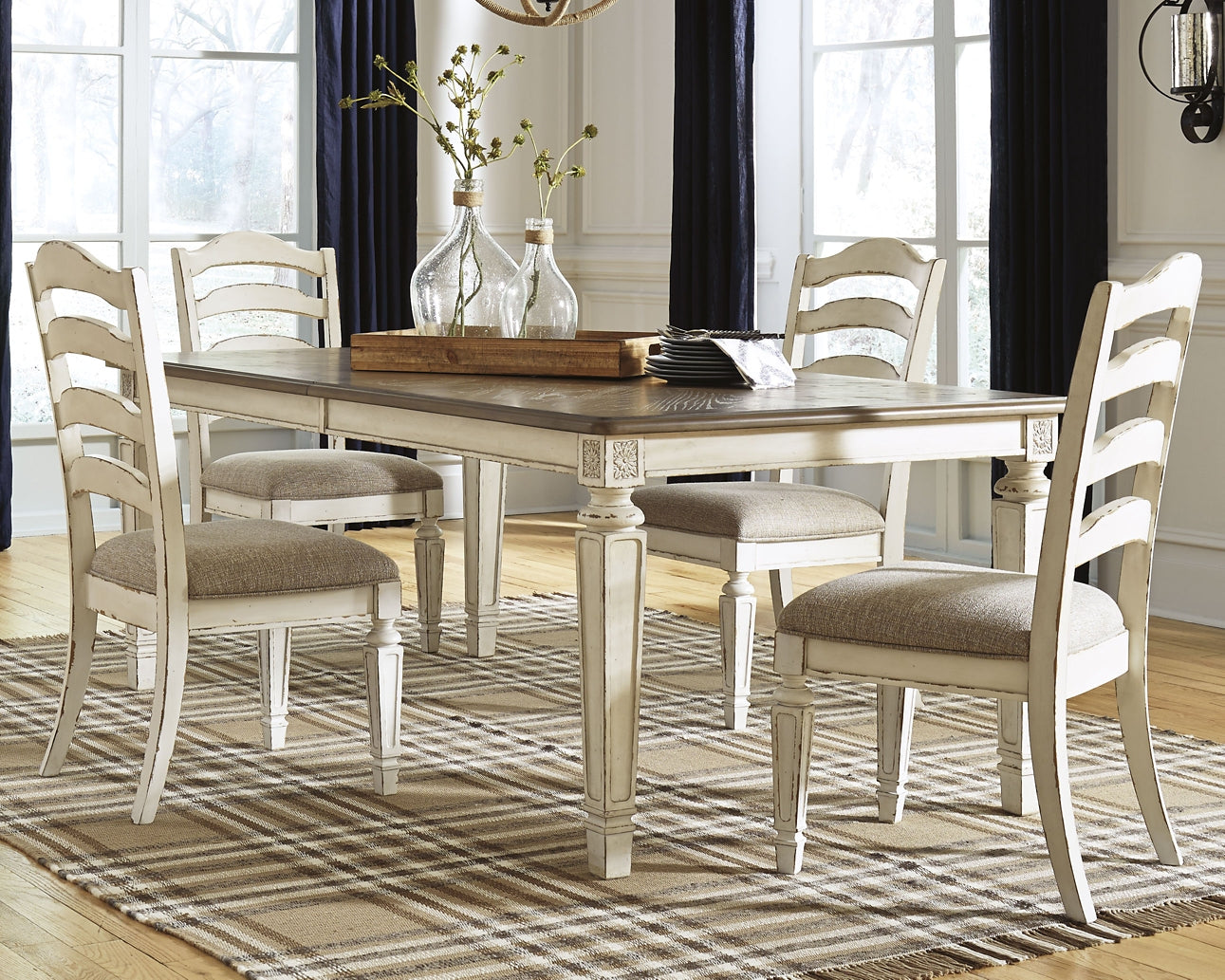 Realyn Dining Table and 8 Chairs at Walker Mattress and Furniture Locations in Cedar Park and Belton TX.