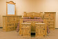 Rustic Mansion Honey Pine Bedroom Set at Walker Mattress and Furniture Locations in Cedar Park and Belton TX.