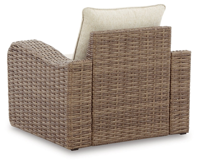 Sandy Bloom Outdoor Lounge Chair and Ottoman at Walker Mattress and Furniture Locations in Cedar Park and Belton TX.