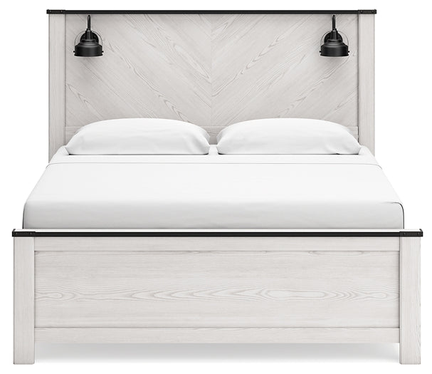 Schoenberg King Panel Bed with Mirrored Dresser and Chest at Walker Mattress and Furniture Locations in Cedar Park and Belton TX.