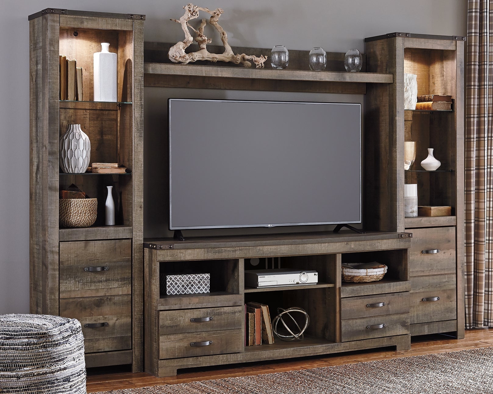 Trinell 4-Piece Entertainment Center at Walker Mattress and Furniture Locations in Cedar Park and Belton TX.