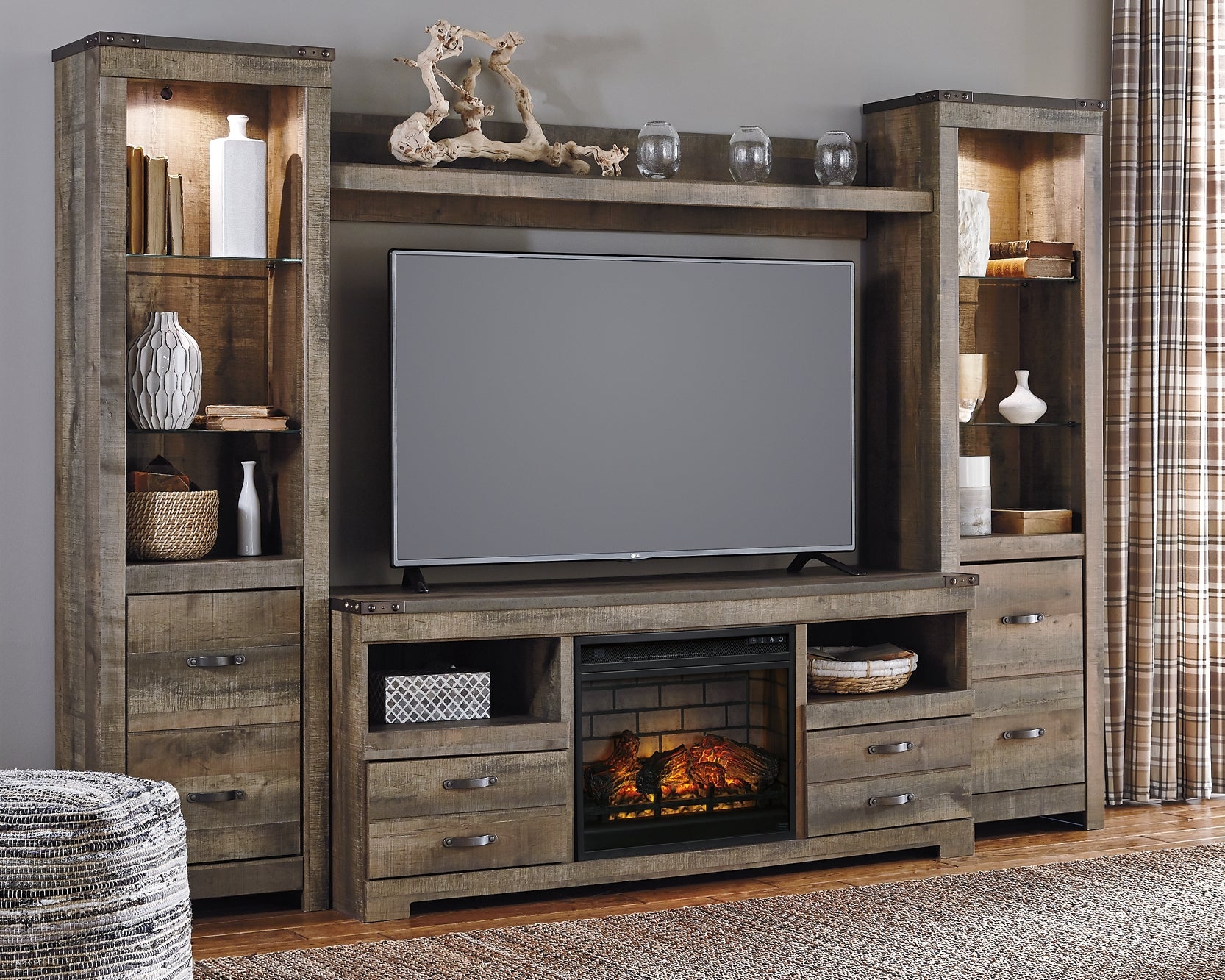 Trinell 4-Piece Entertainment Center with Electric Fireplace at Walker Mattress and Furniture Locations in Cedar Park and Belton TX.