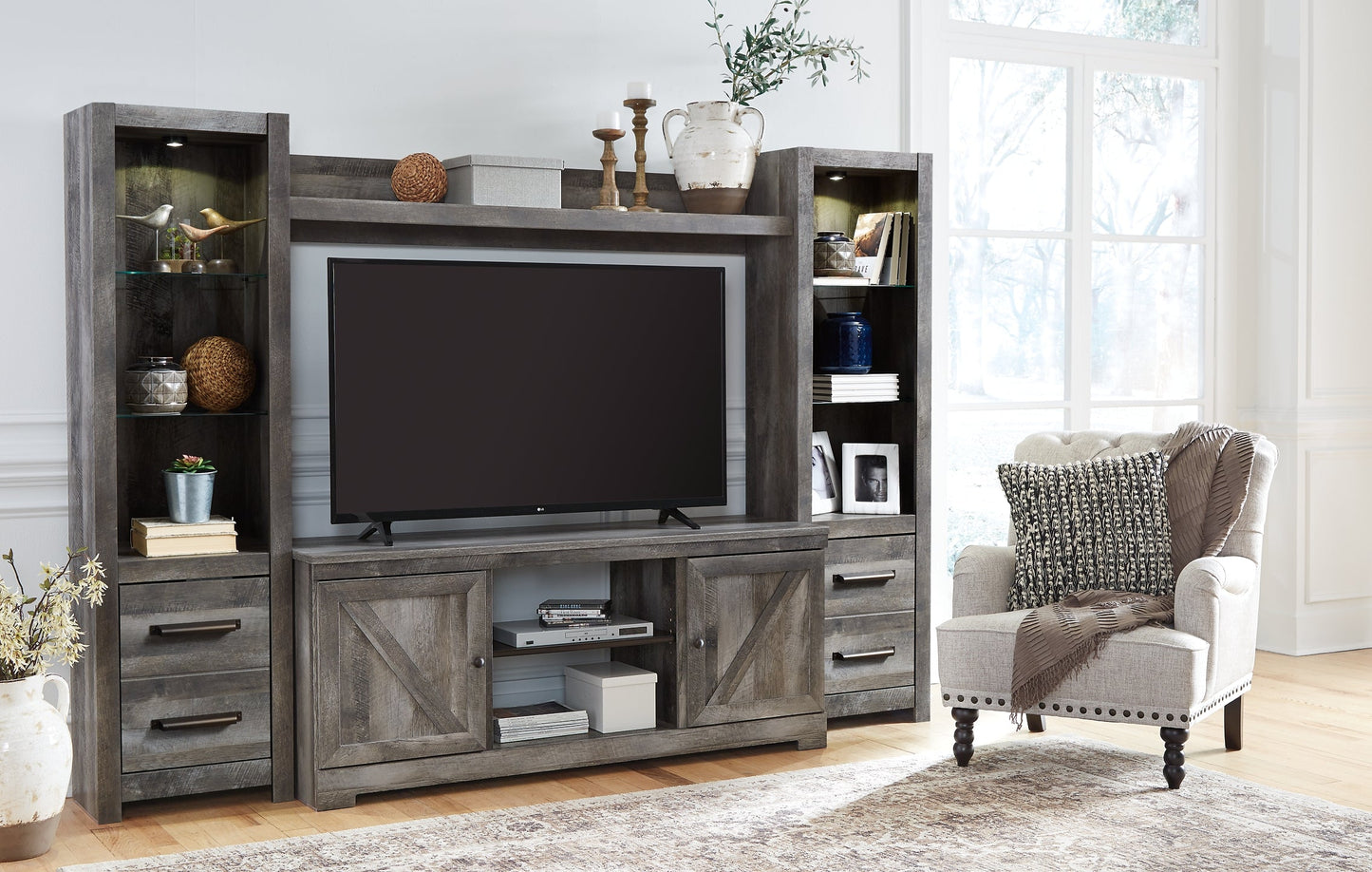 Wynnlow 4-Piece Entertainment Center at Walker Mattress and Furniture Locations in Cedar Park and Belton TX.