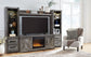 Wynnlow 4-Piece Entertainment Center with Electric Fireplace at Walker Mattress and Furniture Locations in Cedar Park and Belton TX.