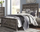 Wynnlow Queen Crossbuck Panel Bed with Mirrored Dresser, Chest and Nightstand at Walker Mattress and Furniture Locations in Cedar Park and Belton TX.