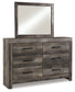 Wynnlow Queen Panel Bed with Mirrored Dresser and Nightstand at Walker Mattress and Furniture Locations in Cedar Park and Belton TX.