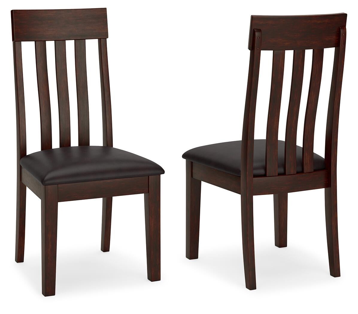 The image shows two Haddigan Dining UPH Side Chairs (2/CN) with a dark brown wood finish, vertical slat backs, and black faux leather upholstered seats—one chair is front-facing, the other angled.