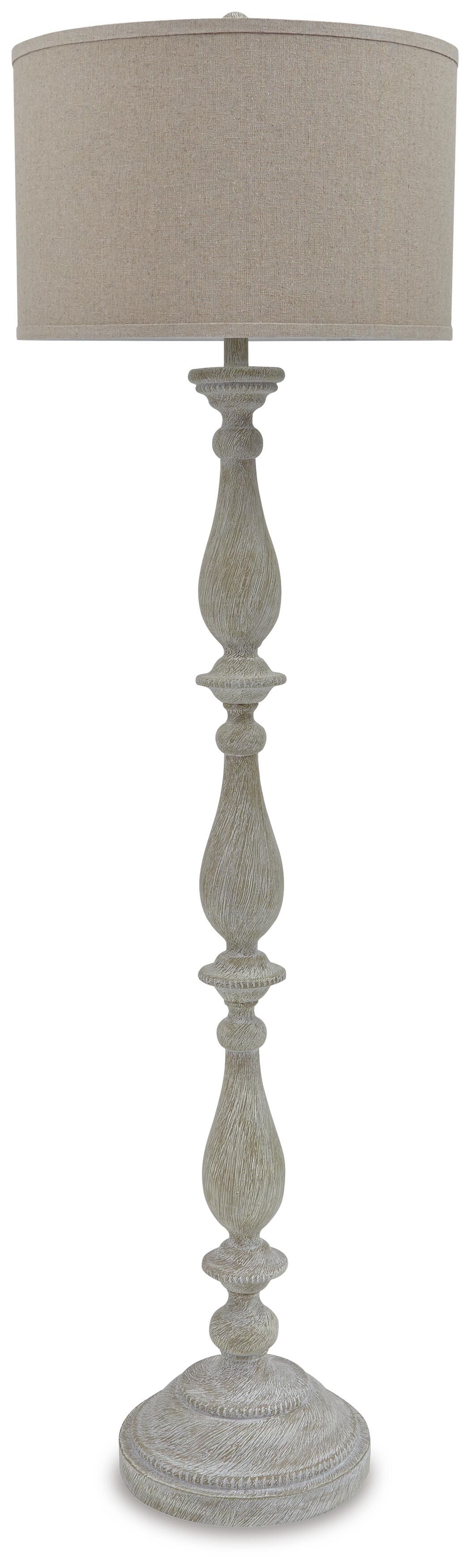The Bernadate Poly Floor Lamp features a textured, carved wooden base with a whitewash finish and a large round beige fabric shade, elegantly designed in a candlestick style.