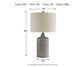 The Linus Ceramic Table Lamp (1/CN) features an antique black ceramic base, beige shade, measures 25"H x 14"W x 14"D, weighs 5 lbs, and includes measurement arrows.