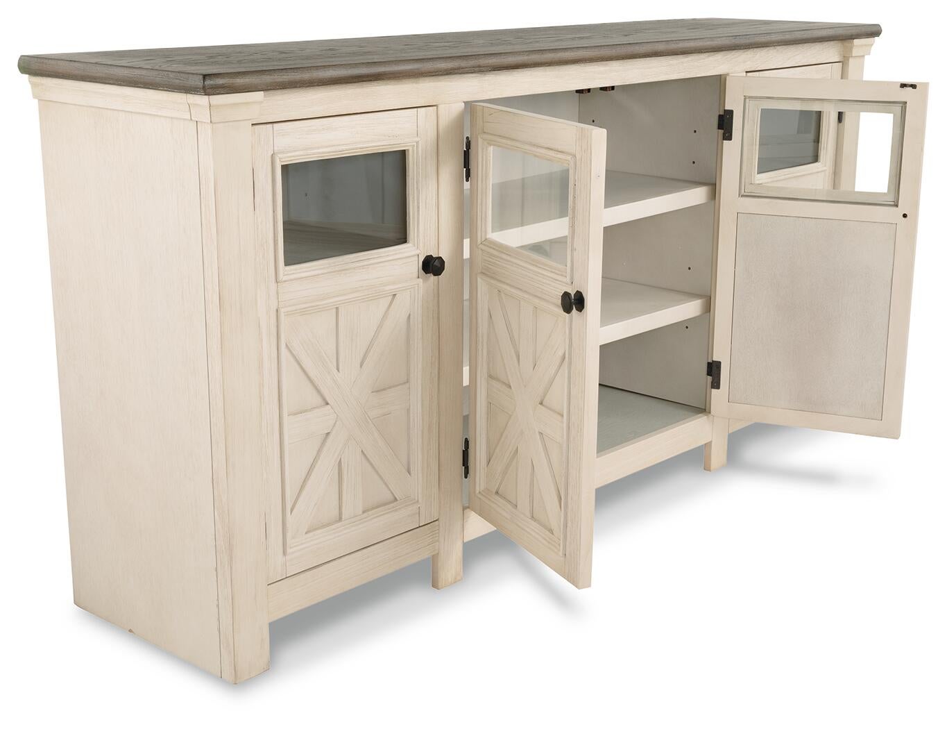 The Bolanburg Extra Large TV Stand features a two-tone farmhouse design with a white wooden base, dark top, two glass-paneled doors, and interior shelves, shown open.