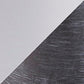 A diagonal split between a smooth light gray top left and a textured dark gray bottom right gives the Shavontae Poly Table Lamp (2/CN) its sleek, modern elegance with subtle contrasts, ideal for contemporary spaces.