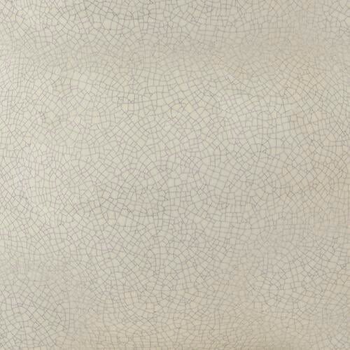 A close-up of the Saffi Ceramic Table Lamp's light beige base showcases a fine, irregular crackle glaze pattern, evoking the look of aged ceramic.