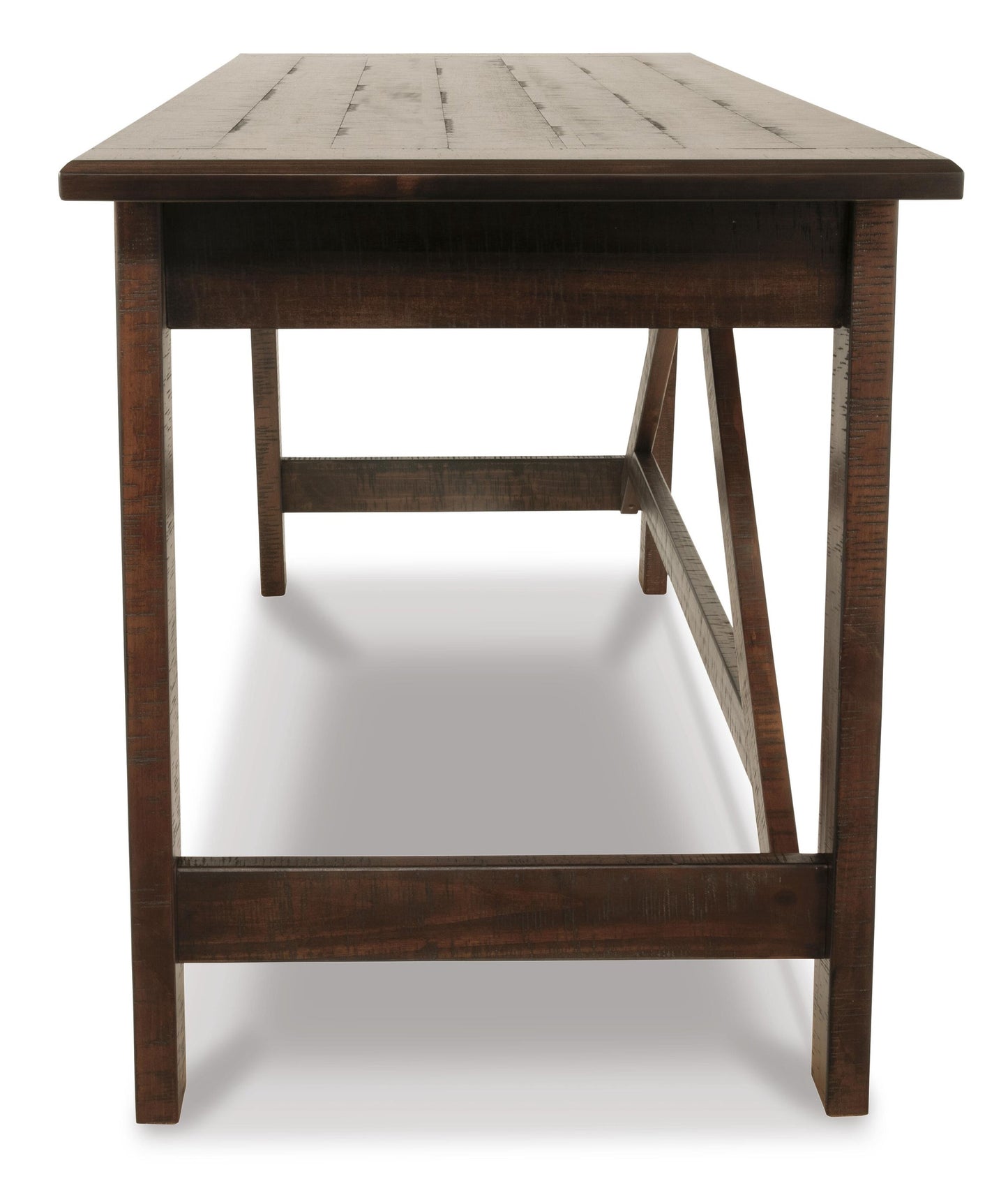 The Baldridge Home Office Large Leg Desk features a rectangular wooden design with a dark finish, visible legs, and support beams—ideal as a rustic industrial or stylish home office desk.