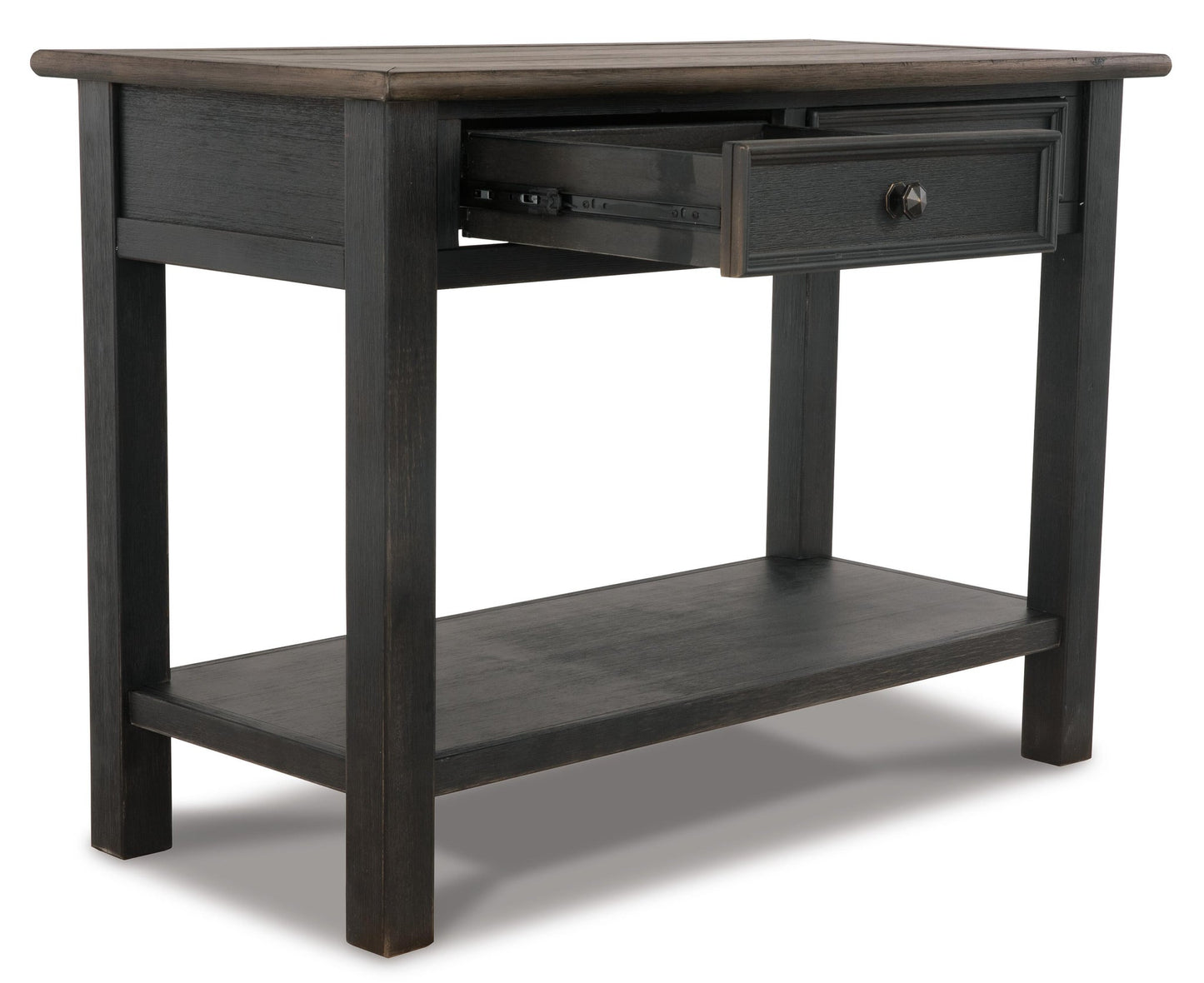 The Tyler Creek Sofa Table features black wood, traditional hardware, one open drawer, and a lower shelf, displayed against a white background.