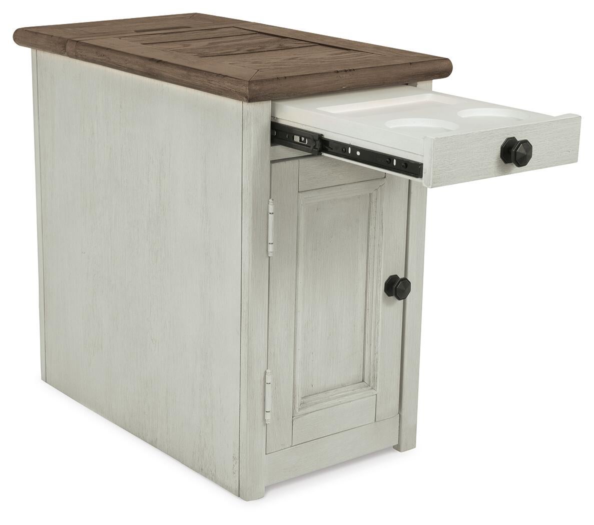 The Bolanburg Chair Side End Table features an antique white finish, brown top, front door, pull-out tray with two cup holders, and built-in USB charging stations.