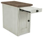 The Bolanburg Chair Side End Table features an antique white finish, brown top, front door, pull-out tray with two cup holders, and built-in USB charging stations.