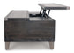 The Todoe Lift Top Cocktail Table is a rustic-industrial rectangular wooden coffee table with angled legs and a lift top that reveals a spacious internal storage compartment.