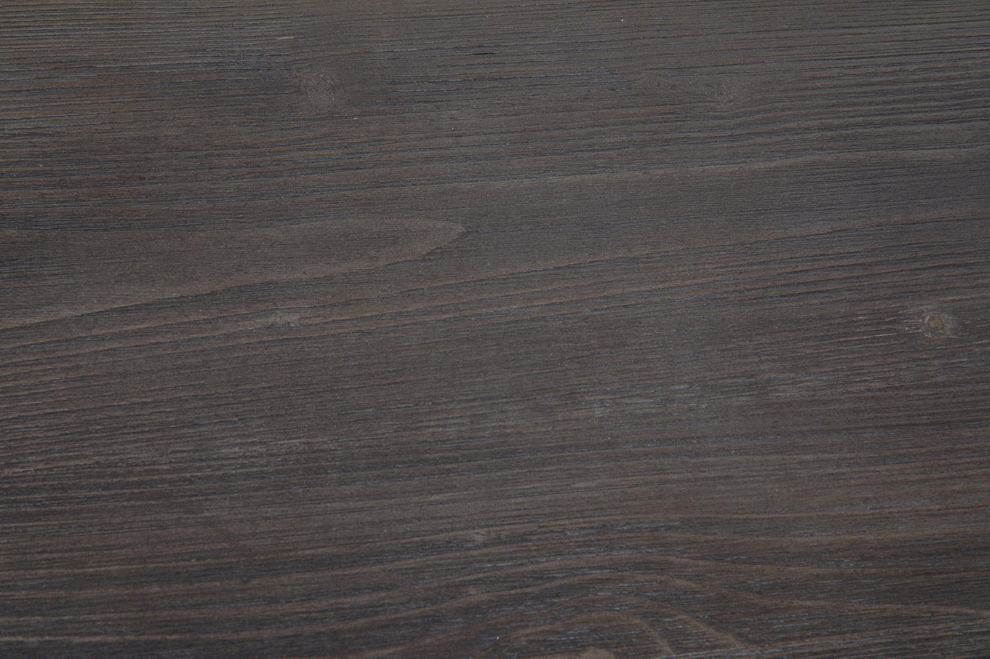 The Todoe Lift Top Cocktail Table features a dark brown wooden surface with visible horizontal grain and subtle texture, capturing the weathered pine look typical of rustic-industrial style tables.