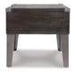 The Todoe Rectangular End Table features a dark-finished wooden storage box set on four gray metal legs, shown from the front against a white background—a modern piece combining elegance and functionality.