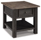 The Tyler Creek Rectangular End Table features a dark solid wood frame, weathered gray-brown top, single drawer, lower shelf, and straight legs—perfect for adding stylish shabby chic charm to any space.