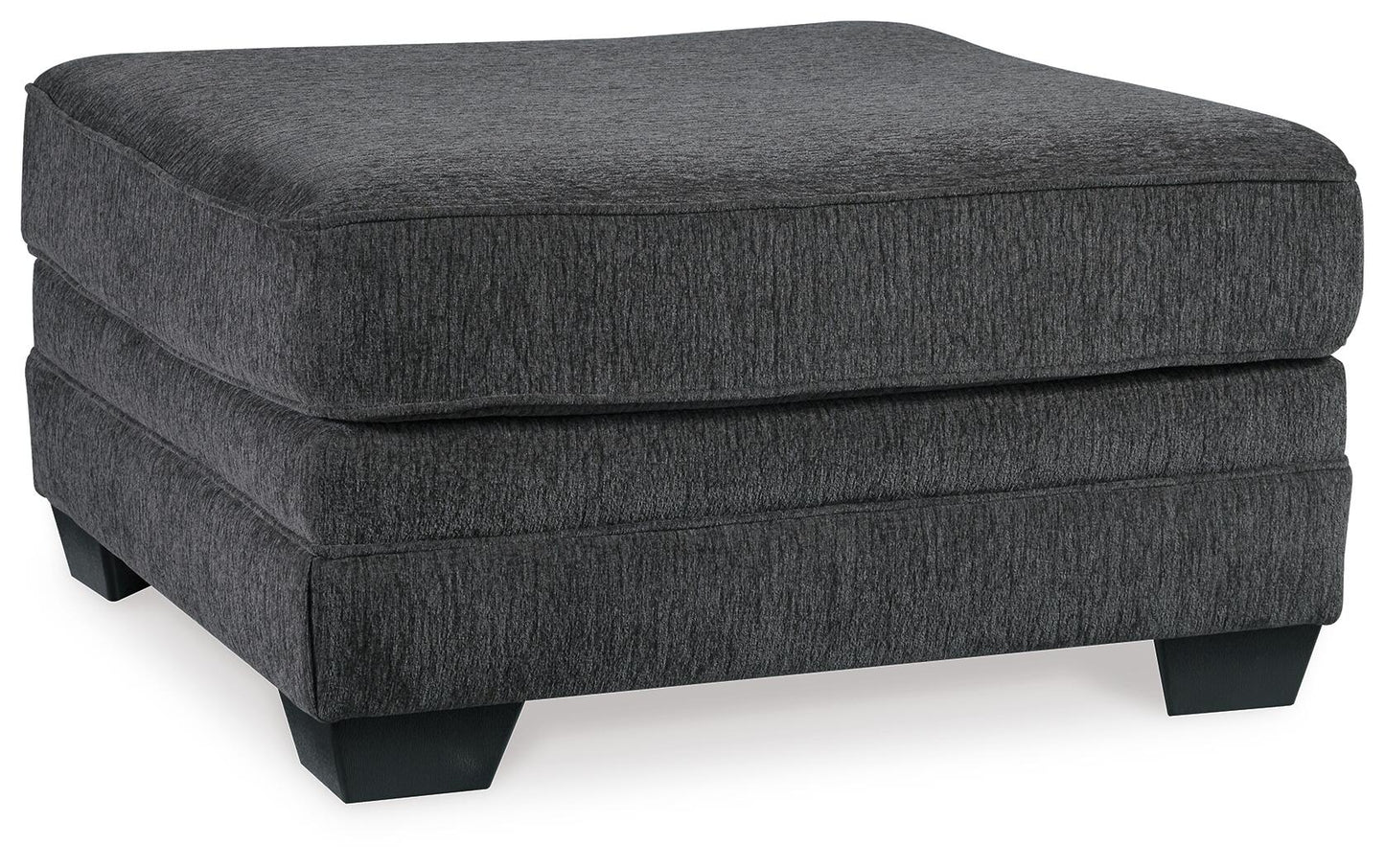 The Tracling Oversized Accent Ottoman features a square slate gray fabric design with a cushioned top and short black legs, making it perfect for adding contemporary style to any space.
