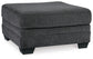 The Tracling Oversized Accent Ottoman features a square slate gray fabric design with a cushioned top and short black legs, making it perfect for adding contemporary style to any space.