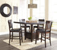 Two Haddigan Upholstered Barstools with slat backs are placed by a dark wood dining table on a light rug in a bright room with large windows, wall decor, and a woven hanging light fixture above the table.