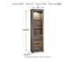 The Trinell Pier is a tall wooden display cabinet with a rustic finish, adjustable glass shelves, two drawers, and built-in lighting. Measures 73.25" H x 21" W x 13.75" D, weighs 35.38 lbs—ideal as an entertainment center pier or for stylish storage.