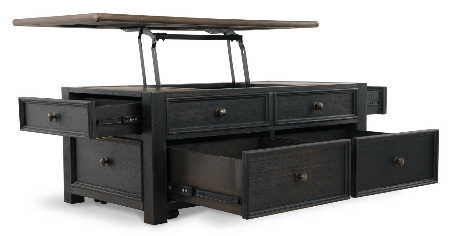 The Tyler Creek Lift Top Cocktail Table is a black wooden table with four open drawers and internal storage, combining style and function.
