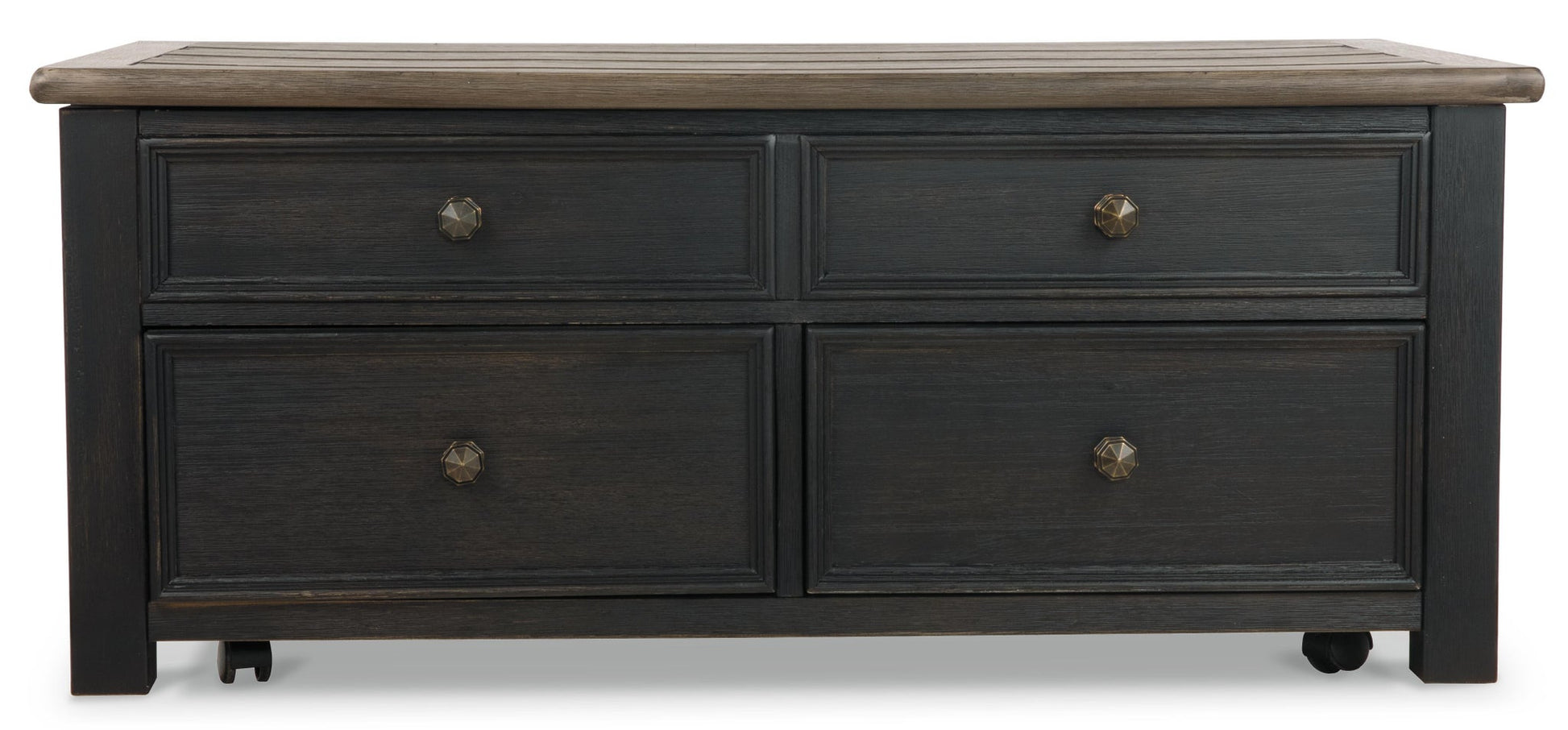 The Tyler Creek Lift Top Cocktail Table features a dark wood finish, four drawers with metal knobs, and small wheels—ideal as a stylish storage coffee table for your living room.