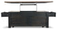 The Tyler Creek Lift Top Cocktail Table features a dark, weathered gray-brown finish and two side drawers that extend outward, highlighting its versatile storage options.