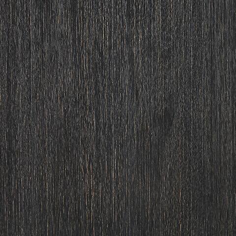 Close-up of a dark, textured wood surface with vertical grain patterns, perfect for the Tyler Creek Rectangular Dining Room Table in an urban farmhouse dining space.