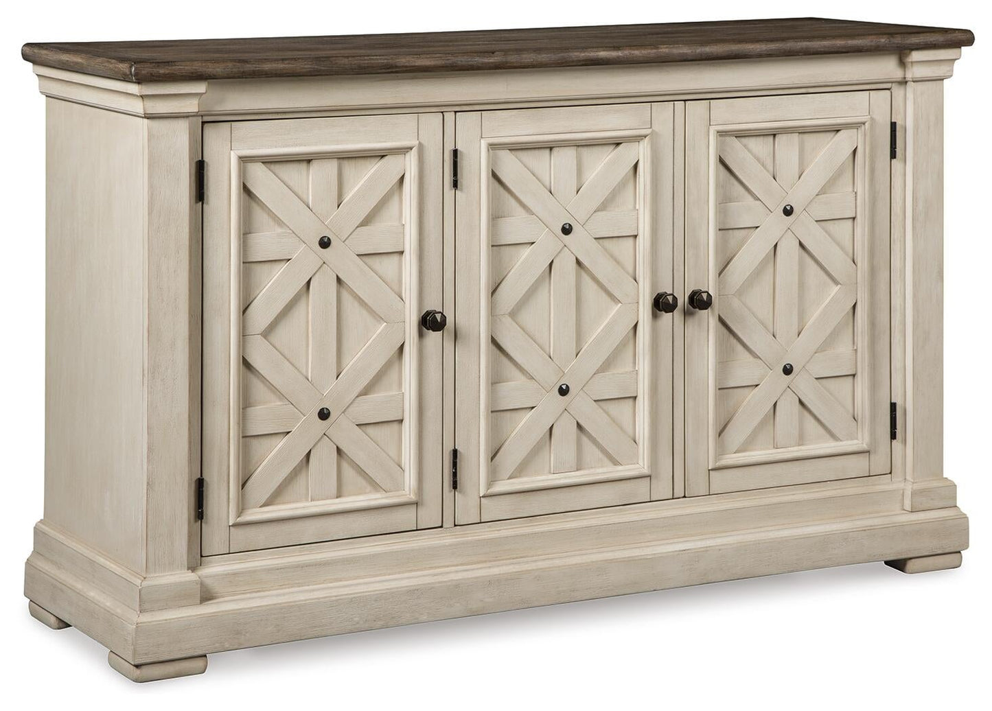 The Bolanburg Dining Room Server is a vintage-inspired wooden sideboard with a weathered oak finish, dark top, and three cream-colored paneled doors featuring a crisscross design and round knobs.