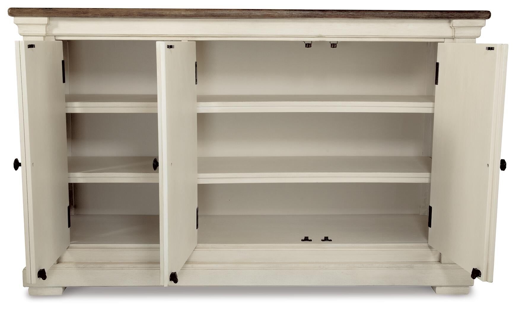 The Bolanburg Dining Room Server features a white wood frame, two open cabinet doors revealing three interior shelves, and a dark weathered oak finish top.