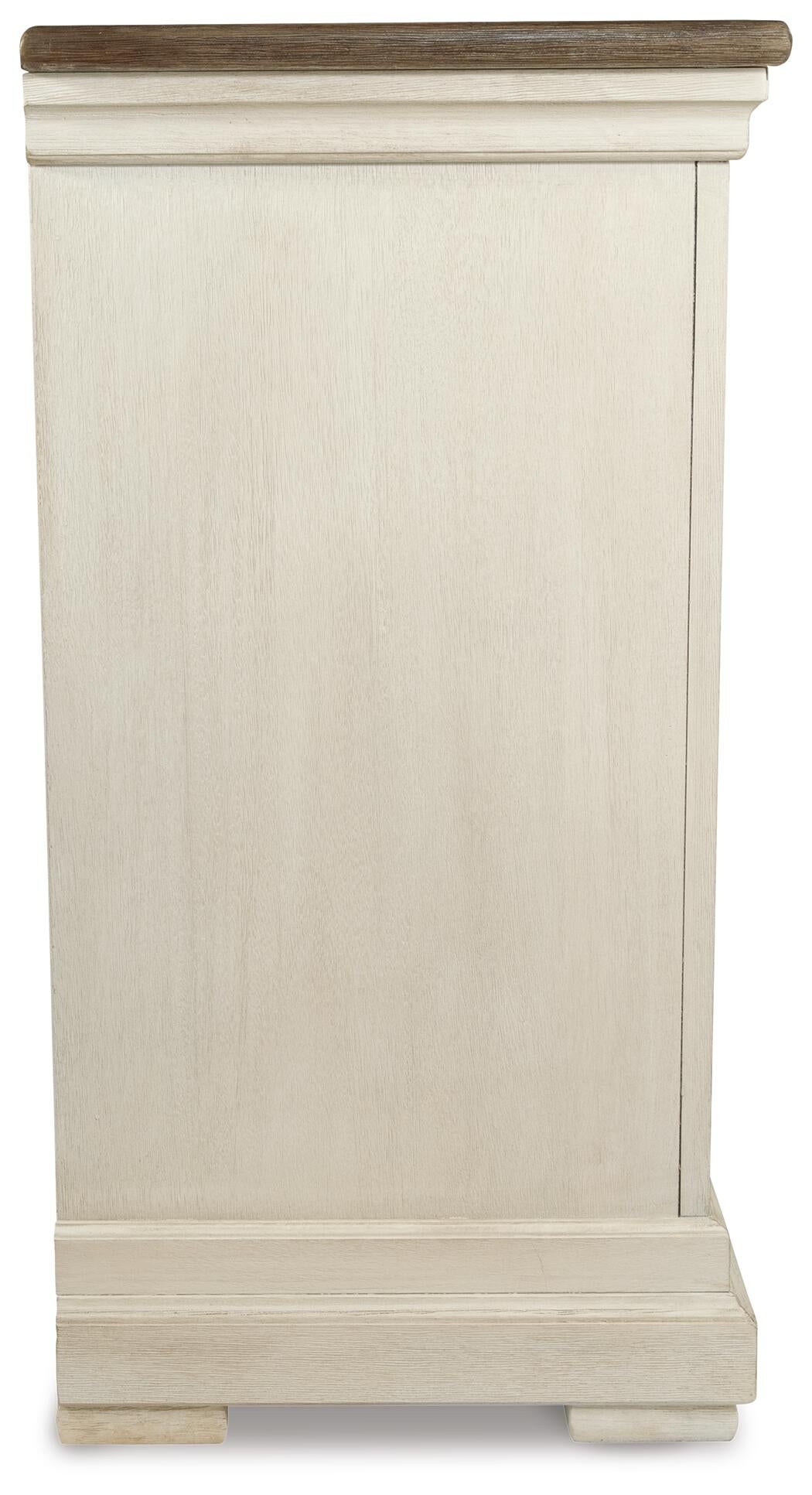 The Bolanburg Dining Room Server features a vintage side view in a weathered oak finish, with a light wood tone, flat top, and simple base—designed without visible handles or decorative accents.