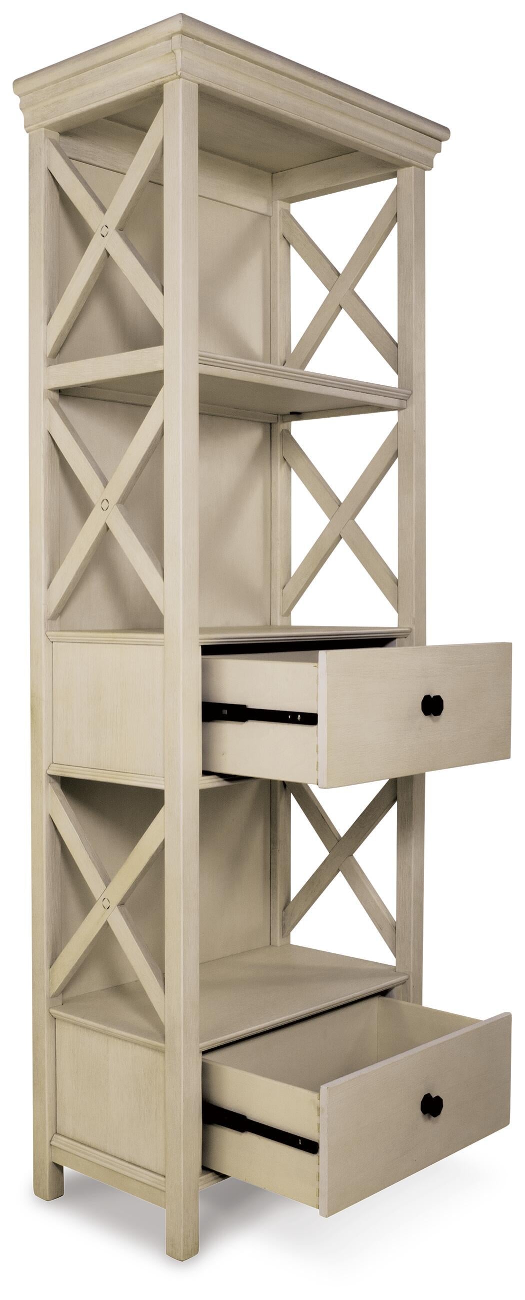The Bolanburg Display Cabinet features an antiqued white finish, two open shelves on top, two partially open drawers below, and decorative X-shaped side panels in a charming cottage style.