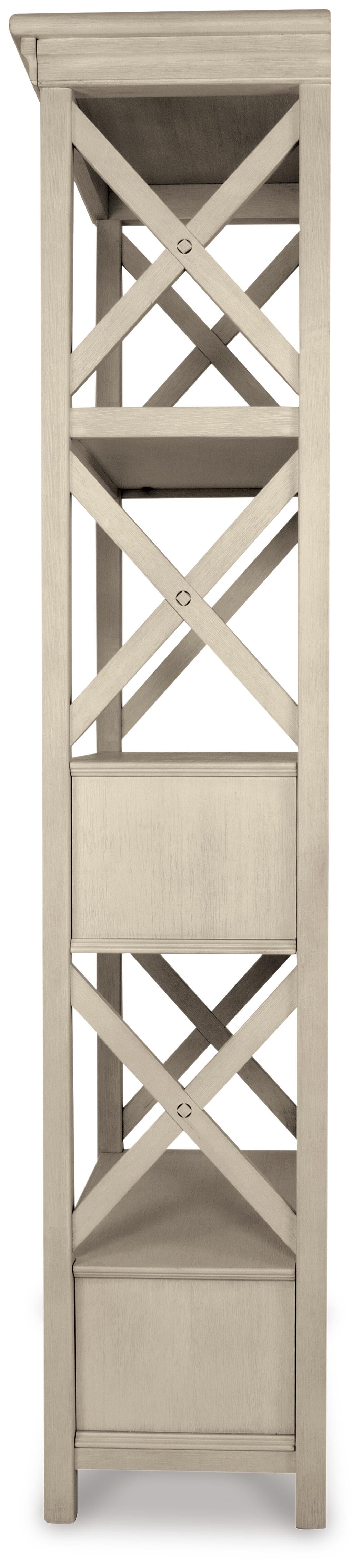 Side view of the Bolanburg Display Cabinet featuring an X-pattern design on the sides, several open shelves, and an antiqued white finish.