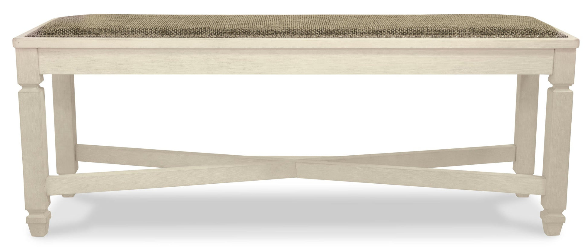 The Bolanburg Large UPH Dining Room Bench features a cushioned, textured rectangular seat and a white wooden frame with cross-braced legs in an antiqued white finish.