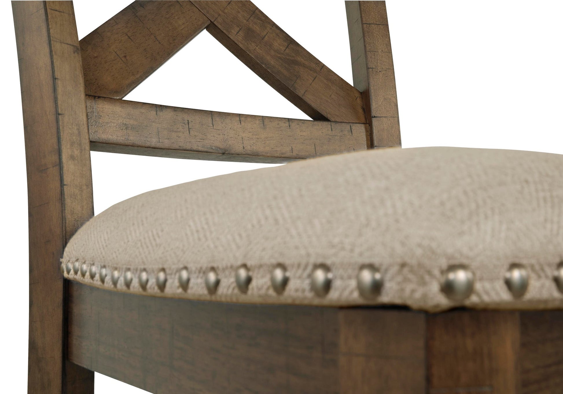 Close-up of the Moriville Upholstered Barstool (2/CN), showcasing its beige cushioned seat, nailhead trim, and a distressed nutmeg finish on the backrest and side.