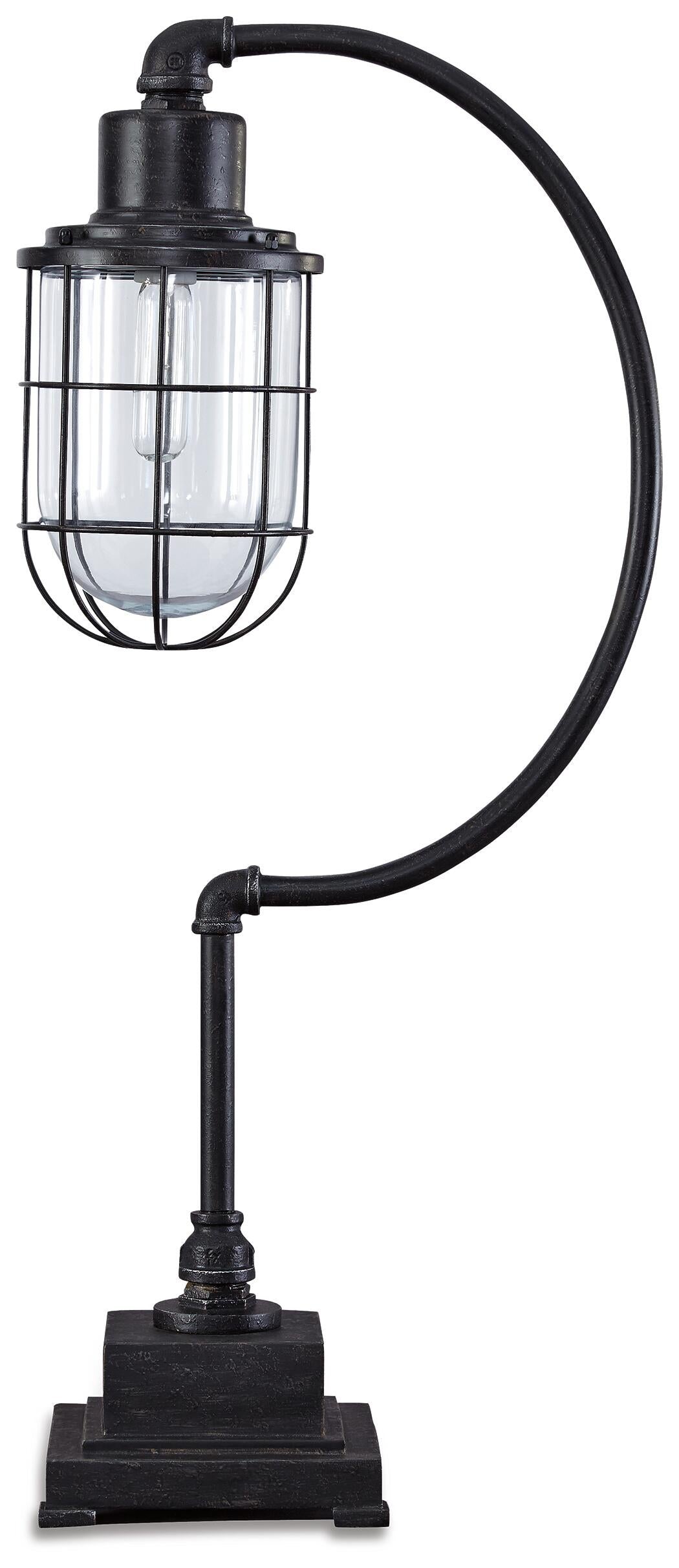 The Jae Metal Desk Lamp (1/CN) features an industrial-chic black metal design with a curved arm, square base, and a caged glass bulb enclosure for a stylish, retro-inspired look.