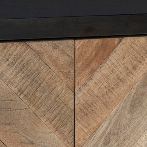 Close-up view of the Robin Ridge Accent Cabinet featuring wooden planks in a chevron pattern with a dark horizontal trim at the top, creating a striking design.