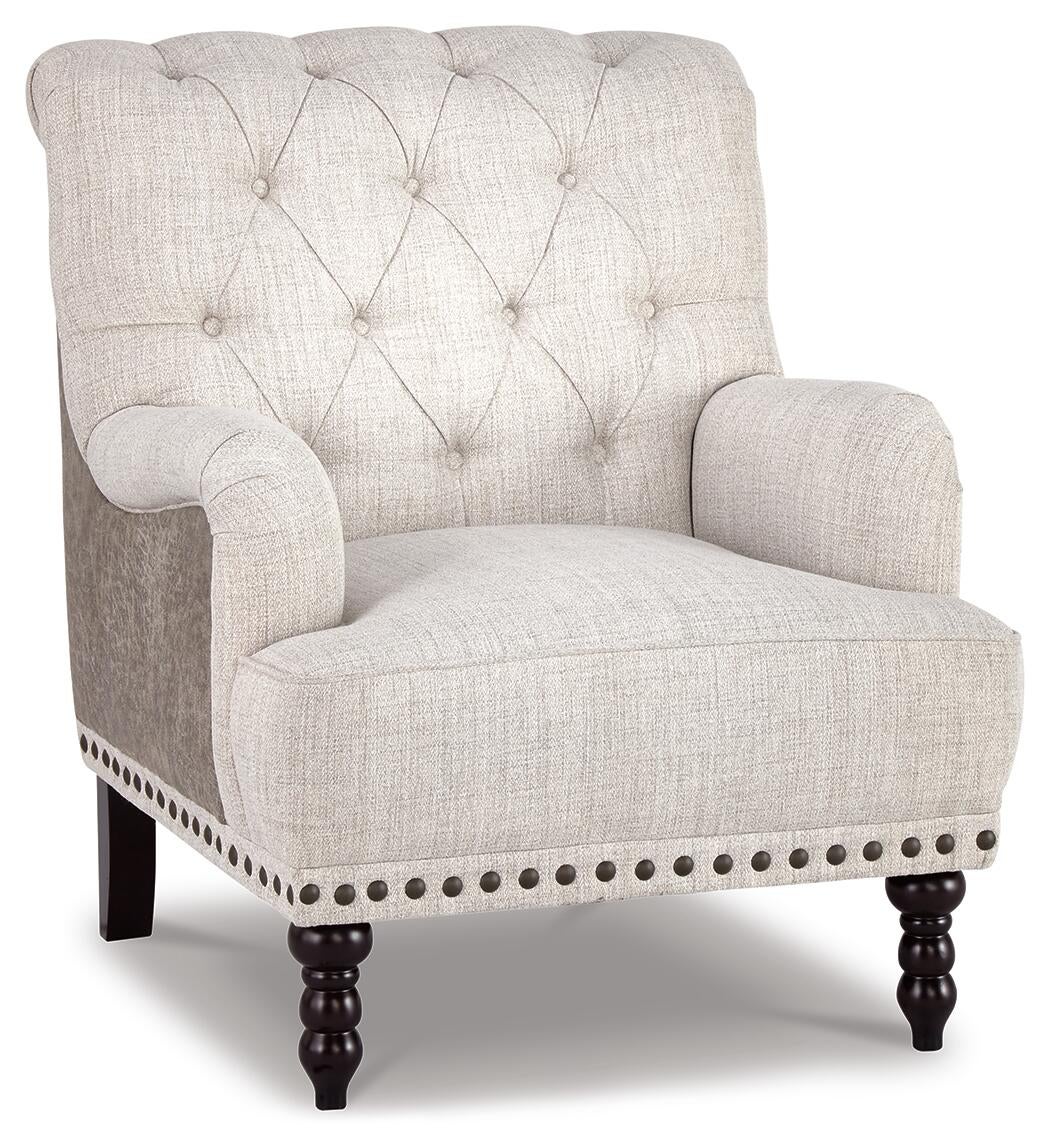 The Tartonelle Accent Chair features a light beige linen weave fabric, button-tufted back, rolled arms, nailhead trim, and dark wooden legs.